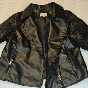 Elegant Black Leather Jacket with Quilted Sleeves